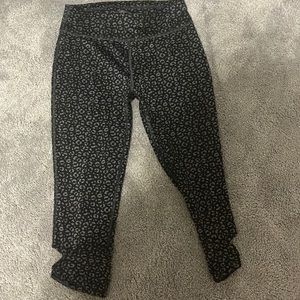 Girls cheetah print capri leggings size 10/12 with opening at bottom of leg